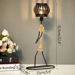 WROUGHT IRON CANDLE HOLDERS